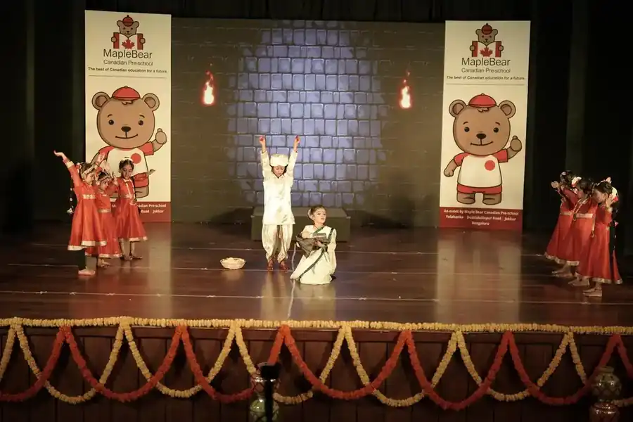 Children performing on stage at annual day